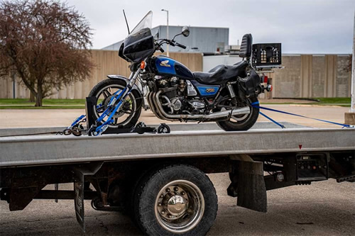Motorcycle being towed safely in Suffolk County